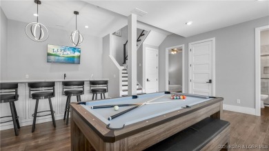 2023 construction, stunning home and is TURNKEY! Stucco & stone on The Club At Porto Cima in Missouri - for sale on GolfHomes.com, golf home, golf lot