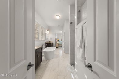 Experience the pinnacle of coastal elegance in this like-new on Members Club At St. James Plantation in North Carolina - for sale on GolfHomes.com, golf home, golf lot