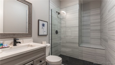 2023 construction, stunning home and is TURNKEY! Stucco & stone on The Club At Porto Cima in Missouri - for sale on GolfHomes.com, golf home, golf lot