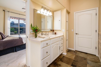 Welcome to this stunning Estrella custom home, situated on 1/2 on Estrella Mountain Ranch Golf Course in Arizona - for sale on GolfHomes.com, golf home, golf lot