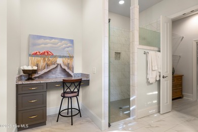 Experience the pinnacle of coastal elegance in this like-new on Members Club At St. James Plantation in North Carolina - for sale on GolfHomes.com, golf home, golf lot