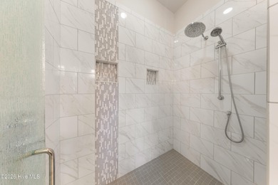 Experience the pinnacle of coastal elegance in this like-new on Members Club At St. James Plantation in North Carolina - for sale on GolfHomes.com, golf home, golf lot