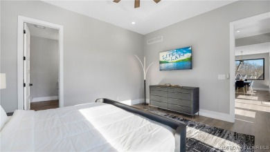 2023 construction, stunning home and is TURNKEY! Stucco & stone on The Club At Porto Cima in Missouri - for sale on GolfHomes.com, golf home, golf lot