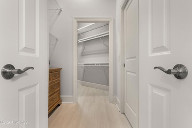 Experience the pinnacle of coastal elegance in this like-new on Members Club At St. James Plantation in North Carolina - for sale on GolfHomes.com, golf home, golf lot