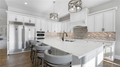 2023 construction, stunning home and is TURNKEY! Stucco & stone on The Club At Porto Cima in Missouri - for sale on GolfHomes.com, golf home, golf lot