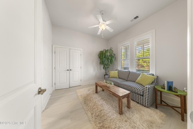 Experience the pinnacle of coastal elegance in this like-new on Members Club At St. James Plantation in North Carolina - for sale on GolfHomes.com, golf home, golf lot