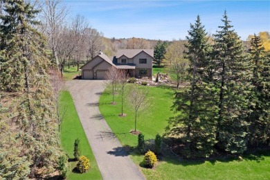 Tucked within the prestigious and serene Lake Riley Woods on Halla Green Executive Golf Course in Minnesota - for sale on GolfHomes.com, golf home, golf lot