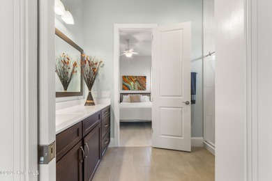 Experience the pinnacle of coastal elegance in this like-new on Members Club At St. James Plantation in North Carolina - for sale on GolfHomes.com, golf home, golf lot