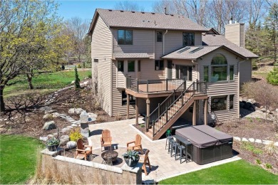 Tucked within the prestigious and serene Lake Riley Woods on Halla Green Executive Golf Course in Minnesota - for sale on GolfHomes.com, golf home, golf lot