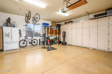 Welcome to this stunning Estrella custom home, situated on 1/2 on Estrella Mountain Ranch Golf Course in Arizona - for sale on GolfHomes.com, golf home, golf lot