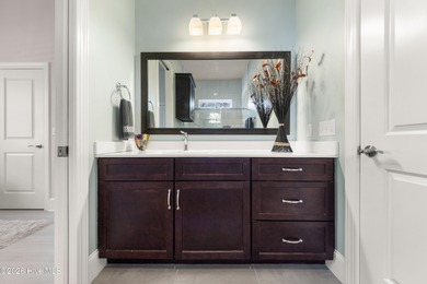 Experience the pinnacle of coastal elegance in this like-new on Members Club At St. James Plantation in North Carolina - for sale on GolfHomes.com, golf home, golf lot