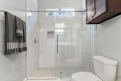 Experience the pinnacle of coastal elegance in this like-new on Members Club At St. James Plantation in North Carolina - for sale on GolfHomes.com, golf home, golf lot