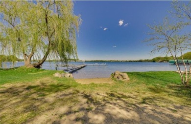 Tucked within the prestigious and serene Lake Riley Woods on Halla Green Executive Golf Course in Minnesota - for sale on GolfHomes.com, golf home, golf lot