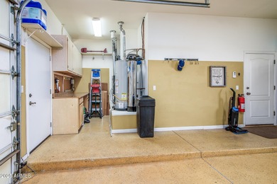 Welcome to this stunning Estrella custom home, situated on 1/2 on Estrella Mountain Ranch Golf Course in Arizona - for sale on GolfHomes.com, golf home, golf lot