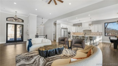 2023 construction, stunning home and is TURNKEY! Stucco & stone on The Club At Porto Cima in Missouri - for sale on GolfHomes.com, golf home, golf lot