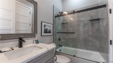 2023 construction, stunning home and is TURNKEY! Stucco & stone on The Club At Porto Cima in Missouri - for sale on GolfHomes.com, golf home, golf lot