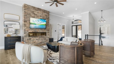 2023 construction, stunning home and is TURNKEY! Stucco & stone on The Club At Porto Cima in Missouri - for sale on GolfHomes.com, golf home, golf lot