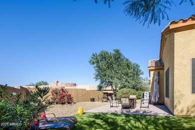 Welcome to this stunning Estrella custom home, situated on 1/2 on Estrella Mountain Ranch Golf Course in Arizona - for sale on GolfHomes.com, golf home, golf lot