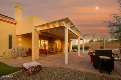 Welcome to this stunning Estrella custom home, situated on 1/2 on Estrella Mountain Ranch Golf Course in Arizona - for sale on GolfHomes.com, golf home, golf lot