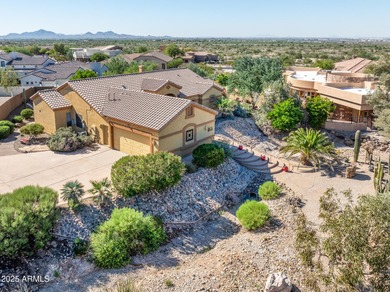 Welcome to this stunning Estrella custom home, situated on 1/2 on Estrella Mountain Ranch Golf Course in Arizona - for sale on GolfHomes.com, golf home, golf lot