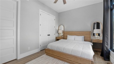 2023 construction, stunning home and is TURNKEY! Stucco & stone on The Club At Porto Cima in Missouri - for sale on GolfHomes.com, golf home, golf lot