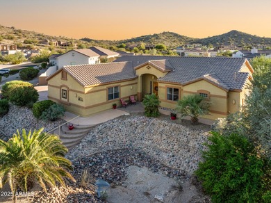 Welcome to this stunning Estrella custom home, situated on 1/2 on Estrella Mountain Ranch Golf Course in Arizona - for sale on GolfHomes.com, golf home, golf lot