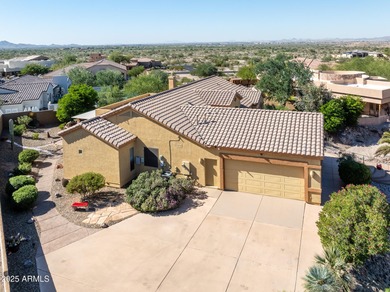 Welcome to this stunning Estrella custom home, situated on 1/2 on Estrella Mountain Ranch Golf Course in Arizona - for sale on GolfHomes.com, golf home, golf lot