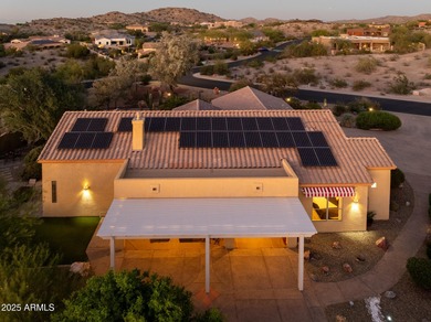 Welcome to this stunning Estrella custom home, situated on 1/2 on Estrella Mountain Ranch Golf Course in Arizona - for sale on GolfHomes.com, golf home, golf lot
