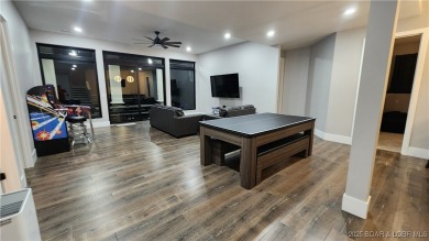 2023 construction, stunning home and is TURNKEY! Stucco & stone on The Club At Porto Cima in Missouri - for sale on GolfHomes.com, golf home, golf lot