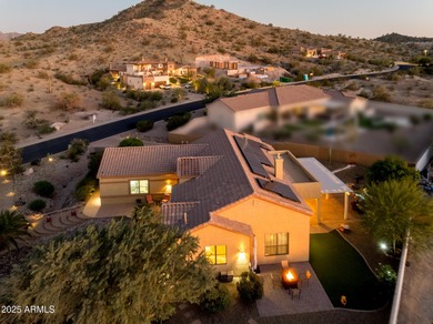 Welcome to this stunning Estrella custom home, situated on 1/2 on Estrella Mountain Ranch Golf Course in Arizona - for sale on GolfHomes.com, golf home, golf lot