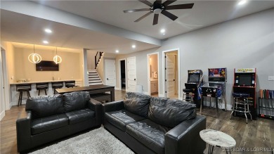 2023 construction, stunning home and is TURNKEY! Stucco & stone on The Club At Porto Cima in Missouri - for sale on GolfHomes.com, golf home, golf lot