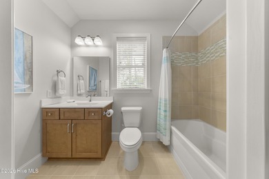 Experience the pinnacle of coastal elegance in this like-new on Members Club At St. James Plantation in North Carolina - for sale on GolfHomes.com, golf home, golf lot