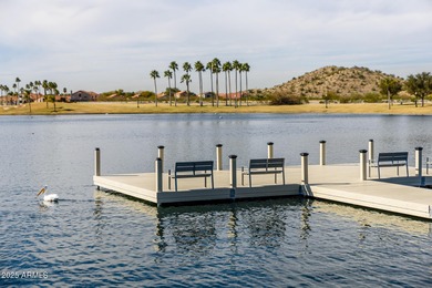 Welcome to this stunning Estrella custom home, situated on 1/2 on Estrella Mountain Ranch Golf Course in Arizona - for sale on GolfHomes.com, golf home, golf lot