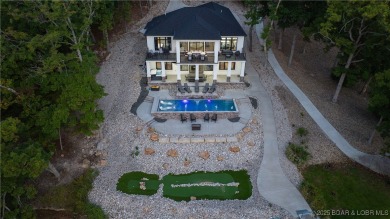 2023 construction, stunning home and is TURNKEY! Stucco & stone on The Club At Porto Cima in Missouri - for sale on GolfHomes.com, golf home, golf lot