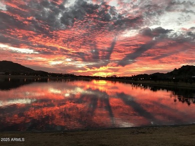 Welcome to this stunning Estrella custom home, situated on 1/2 on Estrella Mountain Ranch Golf Course in Arizona - for sale on GolfHomes.com, golf home, golf lot