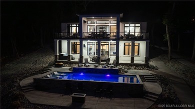 2023 construction, stunning home and is TURNKEY! Stucco & stone on The Club At Porto Cima in Missouri - for sale on GolfHomes.com, golf home, golf lot