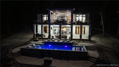 2023 construction, stunning home and is TURNKEY! Stucco & stone on The Club At Porto Cima in Missouri - for sale on GolfHomes.com, golf home, golf lot