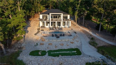 2023 construction, stunning home and is TURNKEY! Stucco & stone on The Club At Porto Cima in Missouri - for sale on GolfHomes.com, golf home, golf lot