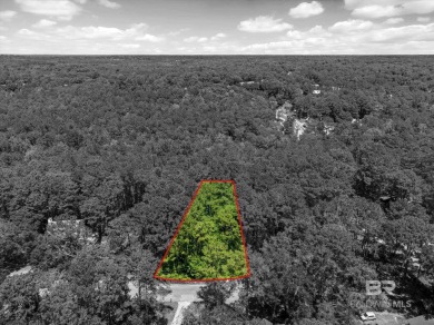 Check out this beautiful wooded lot in the sought-after Lake on Lake Forest Yacht and Country Club in Alabama - for sale on GolfHomes.com, golf home, golf lot