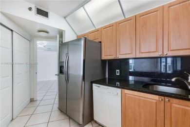 Experience luxury living in this elegant 2-bedroom, 2-bath on Turnberry Isle Resort and Club in Florida - for sale on GolfHomes.com, golf home, golf lot