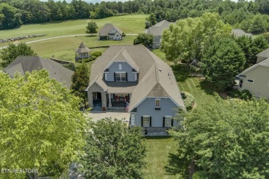 GOLF COURSE, POND, and WATERFALL VIEWS from the back patio on Rarity Bay Country Club - Loudon in Tennessee - for sale on GolfHomes.com, golf home, golf lot