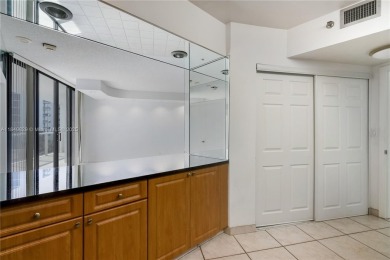Experience luxury living in this elegant 2-bedroom, 2-bath on Turnberry Isle Resort and Club in Florida - for sale on GolfHomes.com, golf home, golf lot