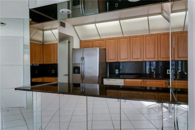 Experience luxury living in this elegant 2-bedroom, 2-bath on Turnberry Isle Resort and Club in Florida - for sale on GolfHomes.com, golf home, golf lot