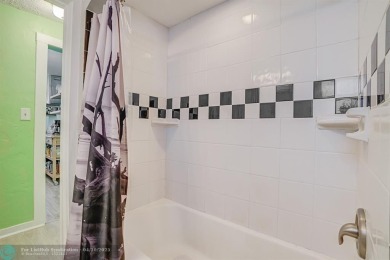 AMAZING LOCATION! This charming 3BR/1.5BA downtown cottage is on Lake Worth Municipal Golf Course in Florida - for sale on GolfHomes.com, golf home, golf lot