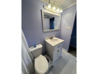 Delight in this nicely appointed two-bedroom, two-bathroom on Palm Hill Golf Club in Florida - for sale on GolfHomes.com, golf home, golf lot