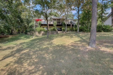 This beautiful home is nestled on the prestigious Balboa Golf on Balboa Golf Course in Arkansas - for sale on GolfHomes.com, golf home, golf lot