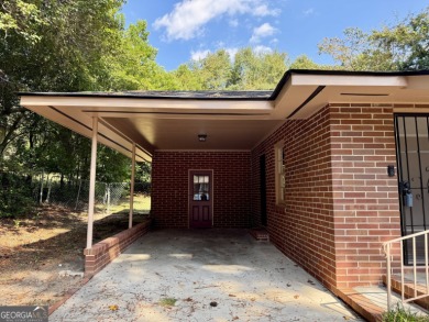 Charming brick home with a brand-new Roof as of August 2025! New on Bowden Golf Course in Georgia - for sale on GolfHomes.com, golf home, golf lot