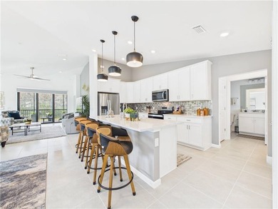 Welcome to elevated, resort-style living at 5683 Mayflower Way on Panther Run Golf Club in Florida - for sale on GolfHomes.com, golf home, golf lot