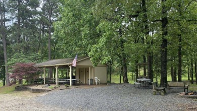 This exceptional golf course double lot of .59 acres, sits south on Diamondhead Golf and Country Club in Arkansas - for sale on GolfHomes.com, golf home, golf lot