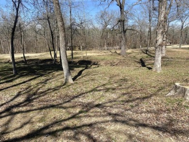 This exceptional golf course double lot of .59 acres, sits south on Diamondhead Golf and Country Club in Arkansas - for sale on GolfHomes.com, golf home, golf lot